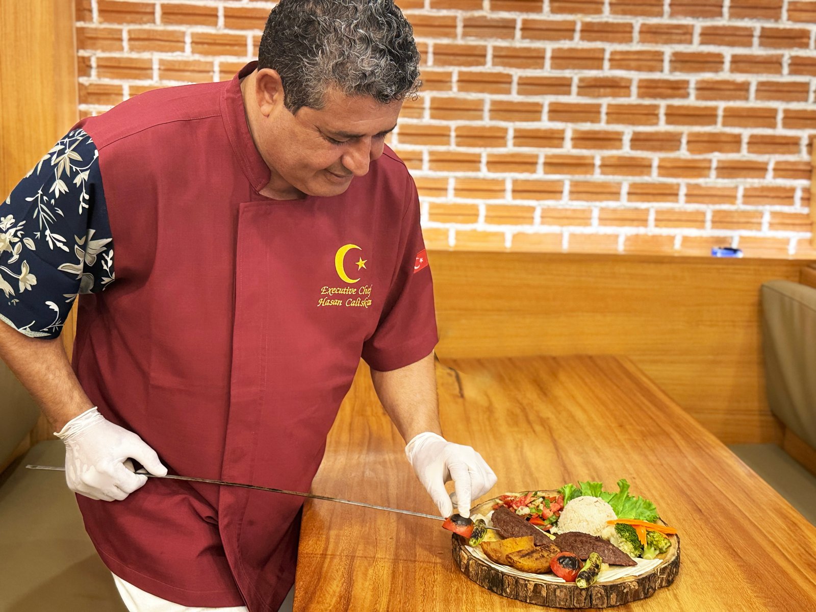 Executive Chef Hasan Çalışkan preparing a traditional Turkish dish